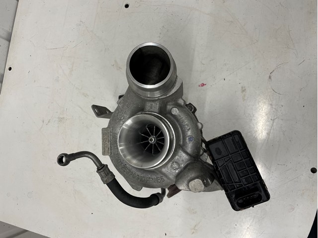 Турбоком 7799758G07 BMW