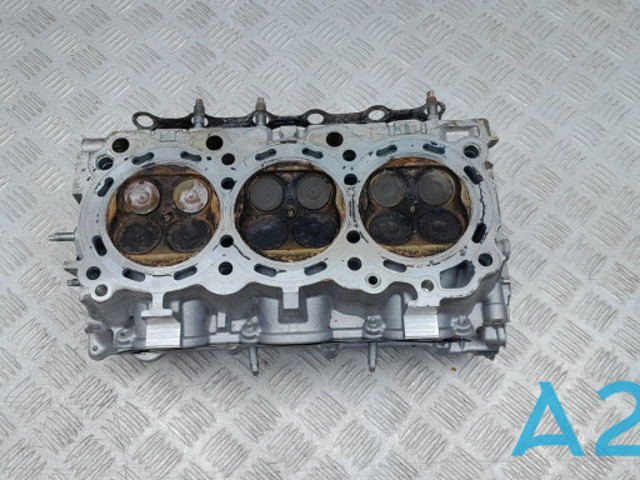 ГБЦ  двигателя 110404GA0A NISSAN
