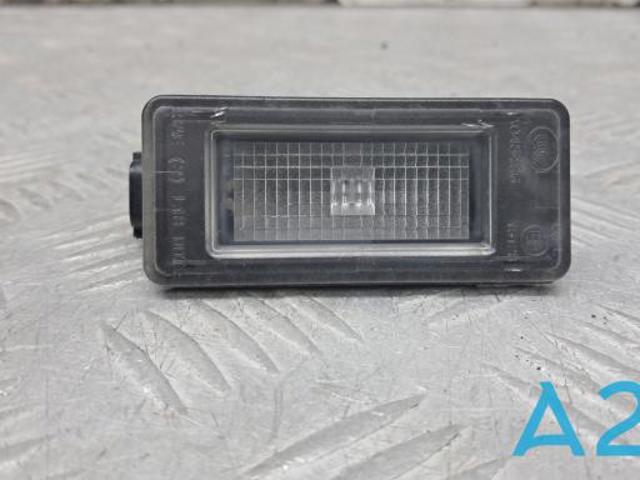 Фонарь освещения номерного знака 265108990E NISSAN