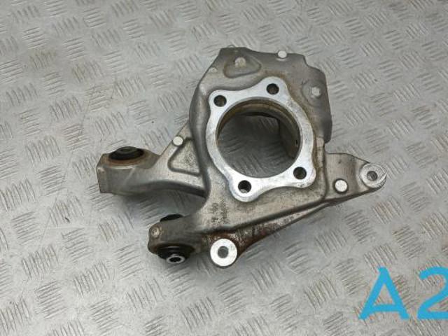 Цапфа (поворотный кулак) задний левый 28411AN03A SUBARU