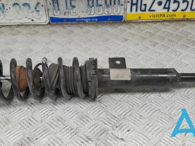 Стойка передняя левая 31316775575 BMW
