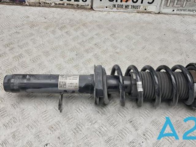 Амортизатор подвески передний левый 31316866613 BMW