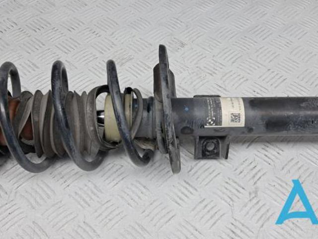 Передний правый амортизатор 31316871780 BMW