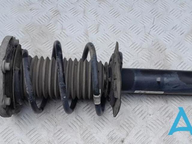 Амортизатор передней подвески левой 31316873725 BMW