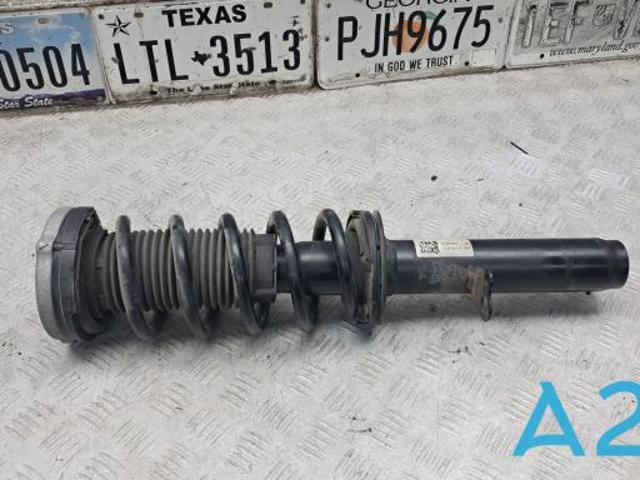 Передний правый амортизатор 31316875922 BMW