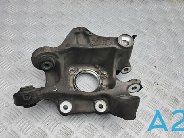Цапфа (поворотный кулак) задний левый 33306866335 BMW