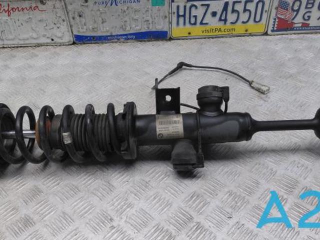 Амортизатор передний левый 37116863117 BMW