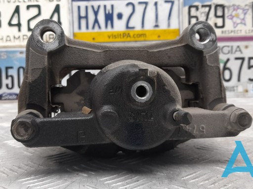 410119N00A NISSAN Суппорт тормозной передний левый купить в Кривой Рог