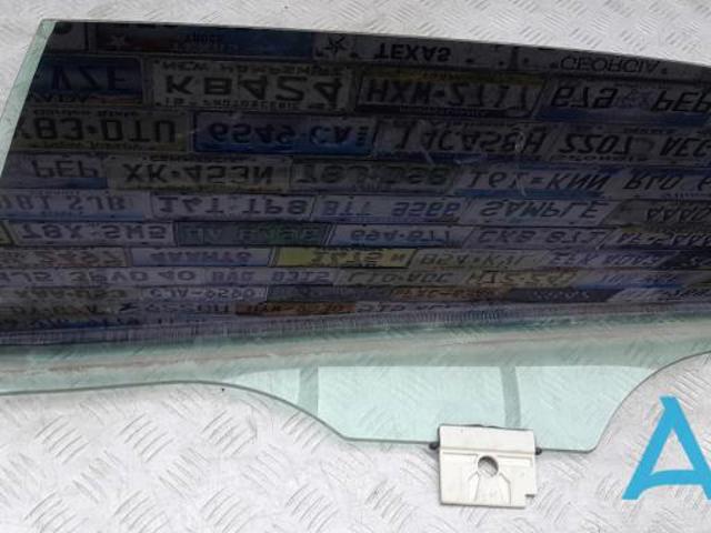 Стекло задней двери, левой 51357409089 BMW