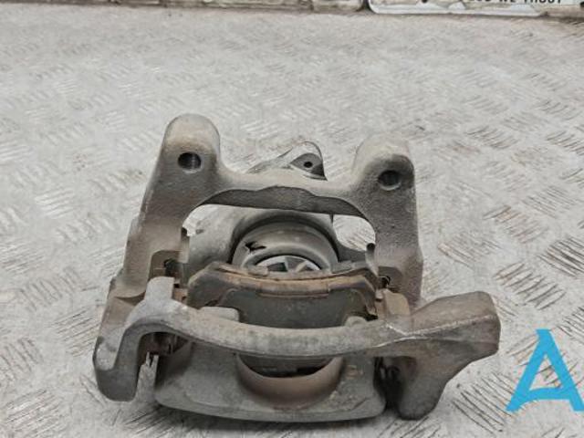 Суппорт тормозной левый задний 5N0615403 VAG