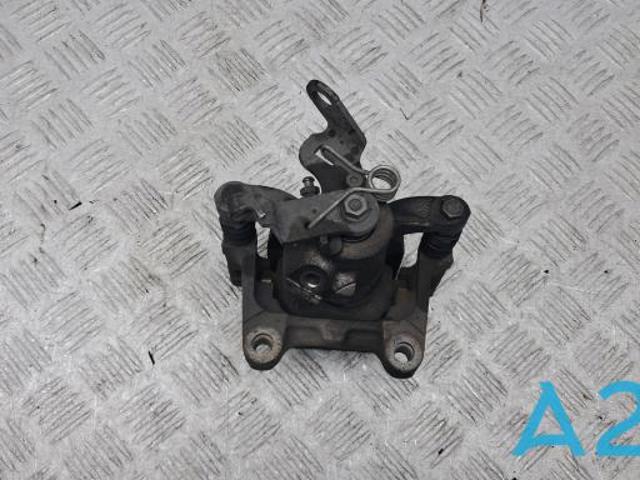 Суппорт тормозной левый задний 5QM615423A VAG