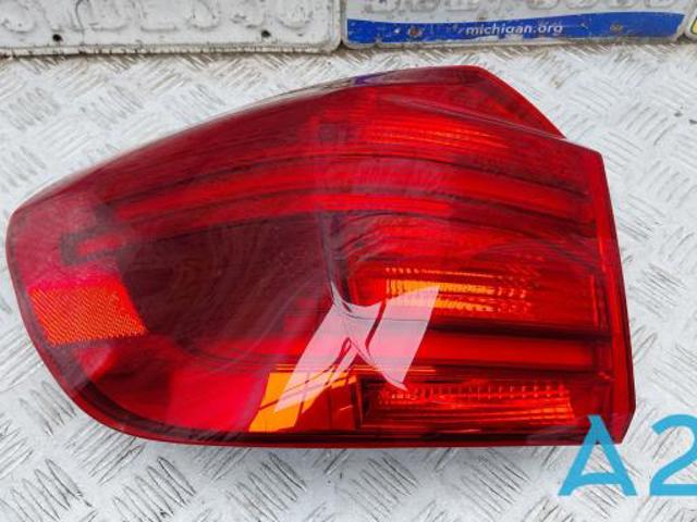Фонарь задний левый, внешний 63217408735 BMW
