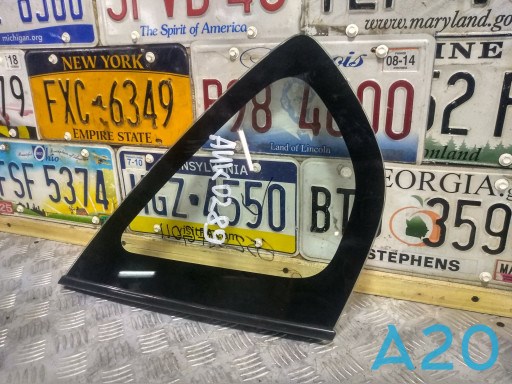 Стекло багажника, левое 65209FG011 SUBARU