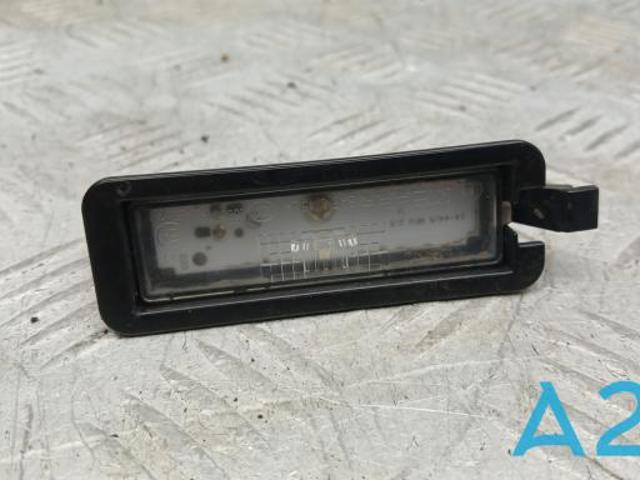 Фонарь подсветки заднего номера 68211290AB CHRYSLER
