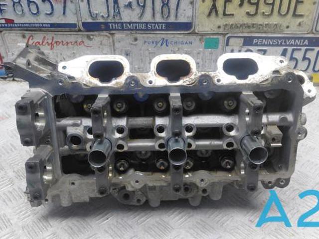 Головка блока цилиндров (ГБЦ), левая 68293289AB CHRYSLER