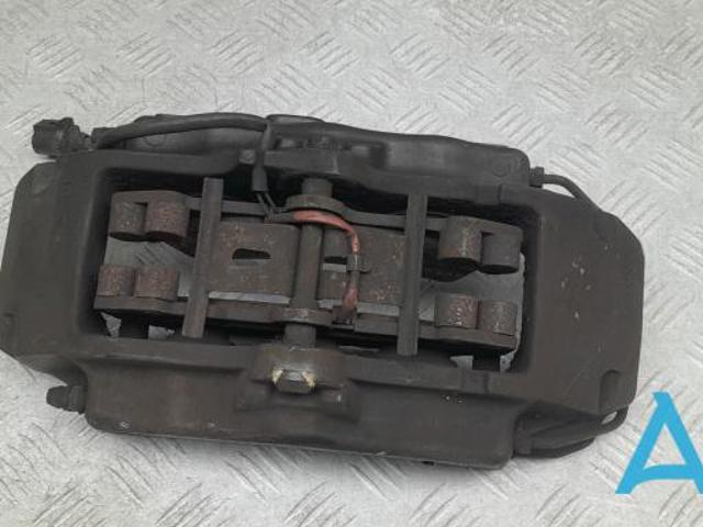 Суппорт тормозной передний левый 7L6615149A VAG