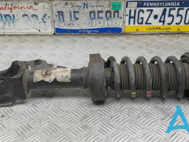 Амортизатор передней подвески левой 7P6413031H VAG