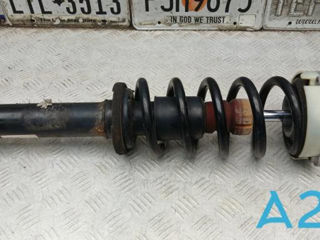 Стойка амортизатора передняя 80A413031AK VAG