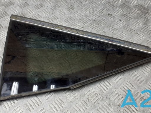 NISSAN 833015AA0A Стекло кузова (багажного отсека) левое в наличии Ирпень