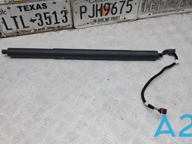 Амортизатор задней двери 83A827851A VAG