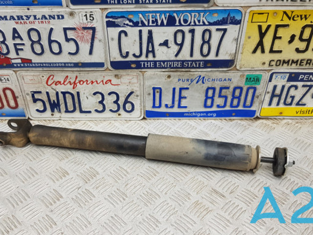 Стойка амортизатора задняя DA8Z18125A FORD