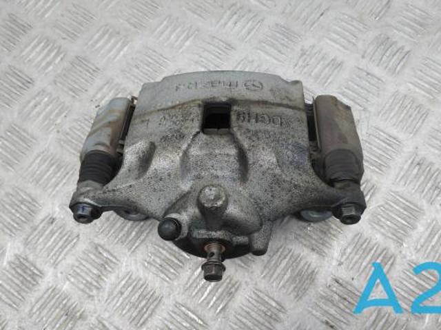 Суппорт тормозной, передний, левый DGY93399Z MAZDA
