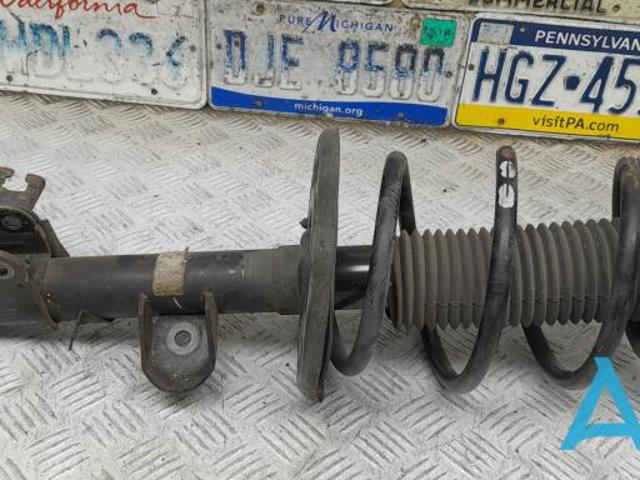 Амортизатор передней подвески левой E43035AA0C NISSAN