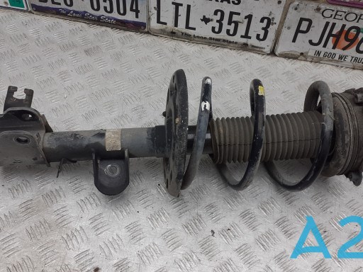 Амортизаторная стойка передняя левая E43039ND0B NISSAN