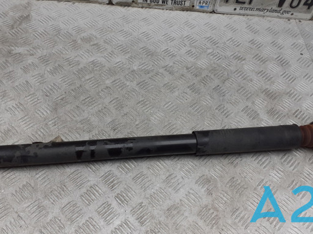 Стойка амортизатора задняя GN1Z18125J FORD
