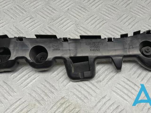 Направляющая заднего бампера, левая KB8A502J1B MAZDA