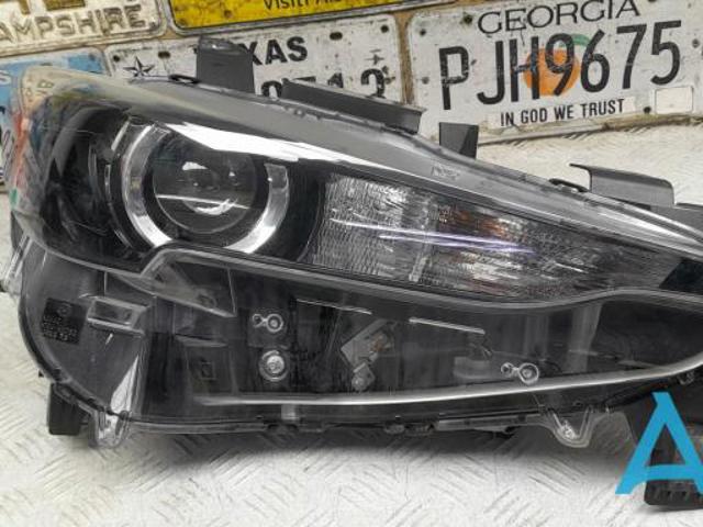 Вставка фары правой KL2J51030 MAZDA