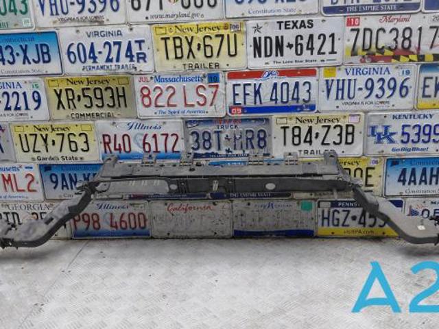 Суппорт радиатора верхний / монтажная панель крепления фар KT4Z16138C FORD