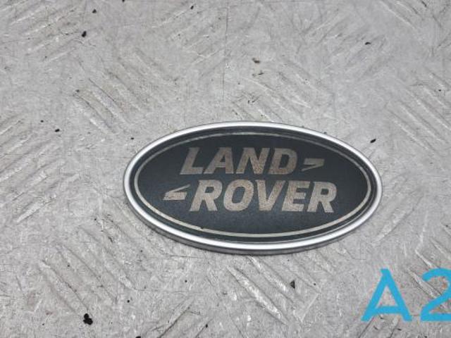 Фирменный значек на багажник LR060140 LAND ROVER
