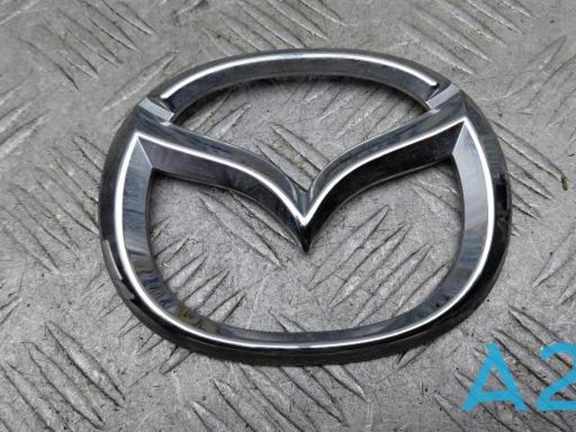 Фирменный значок Mazda CX-9