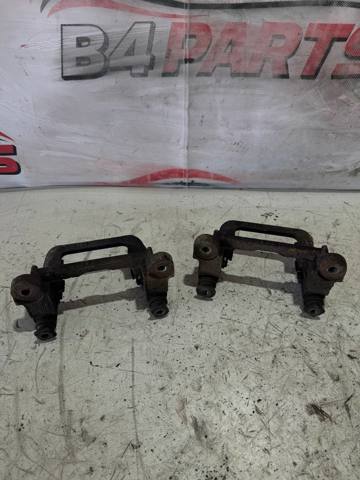 Скоба тормозного заднего суппорта 4605B122 MITSUBISHI