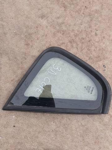 Стекло багажного отсека, левое MR957059 MITSUBISHI