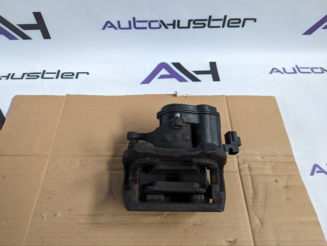 Тормозной суппорт задний левый LR084120 LAND ROVER