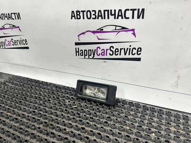 Фонарь освещения номерного знака 5NA943021 VAG