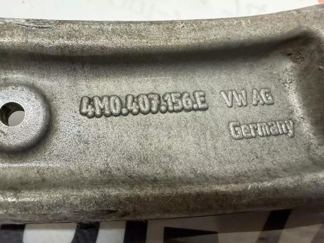 Передний нижний рычаг 4M0407156E VAG
