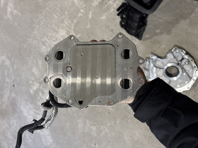 06M117015M VAG Масляный радиатор купить в Каменское