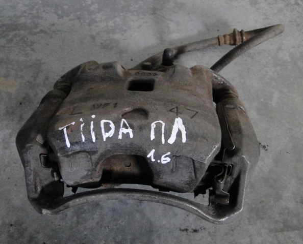 Суппорт тормозной, передний, левый 410111FE0A NISSAN