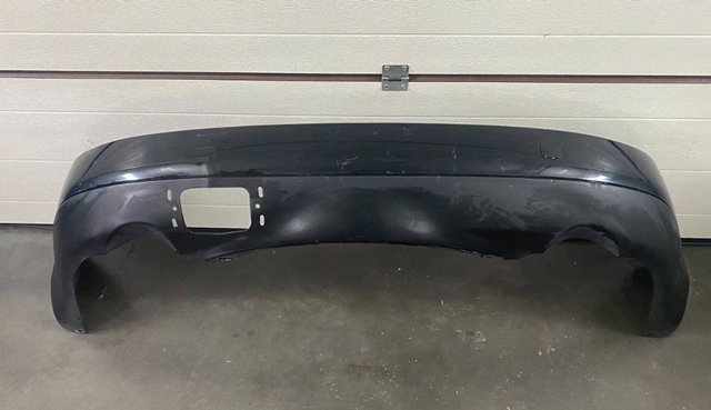 SUBARU 57704XA01A Бампер задний в наличии Каменское