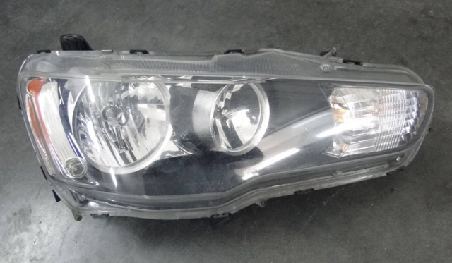 Вставка фары правой 8301A390 MITSUBISHI