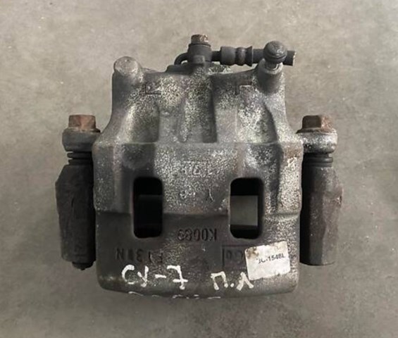 Суппорт тормозной передний левый L2063371X MAZDA