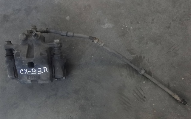 Задний правый суппорт L2Z22698ZB MAZDA