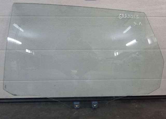 Стекло двери задней левой MN129337 MITSUBISHI