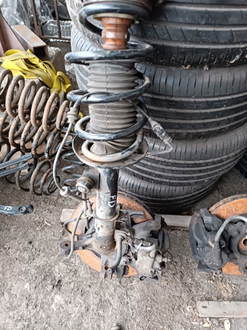 Амортизаторная стойка передняя левая Фиат Добло II