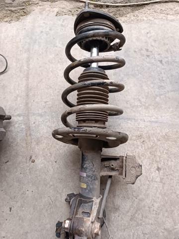 Стойка передняя левая GMM634900 MAZDA