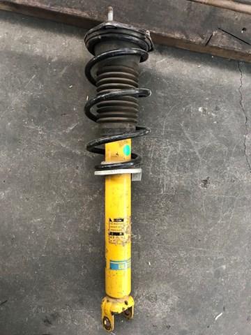Стойка амортизатора передняя NA8W34700B MAZDA