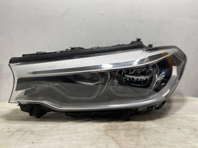 Вставка фары левой 7214961 BMW